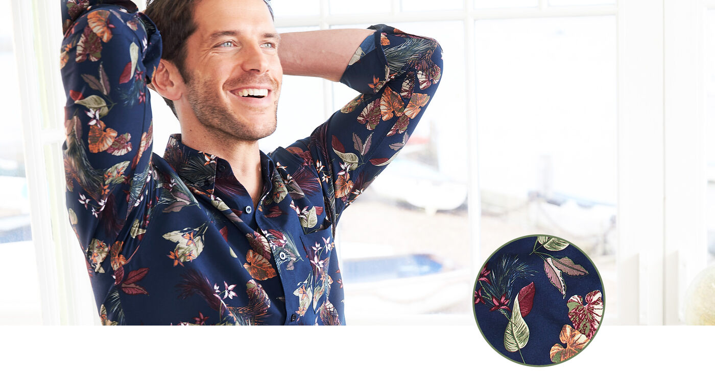 Man smiling wearing a Cotton Traders Floral Long Sleeve Shirt