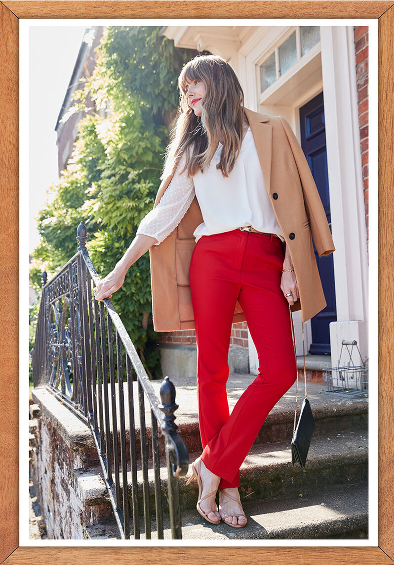 Women’s outfit with red trousers