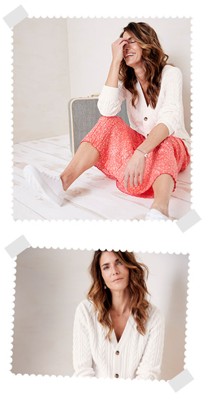 Two images of a woman sat on the floor in a white Cotton Traders kitted cardigan. In the first image she's laughing and in the second she's looking at the camera.