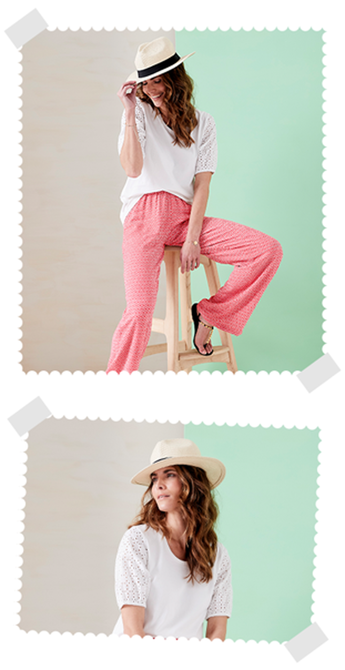 Two images of a woman sat on a wooden chair. In the first image she's wearing Cotton Traders patterned red trousers, a white t-shirt and a white hat with a black trim. On the second image she's looking off the side and is wearing a white crew neck t-shirt and hat.